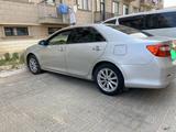 Toyota Camry 2012 года за 3 500 000 тг. в Жанаозен – фото 2