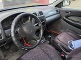 Mazda 323 1998 года за 1 850 000 тг. в Усть-Каменогорск – фото 5