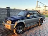 Mitsubishi L200 2002 года за 3 100 000 тг. в Алматы – фото 4