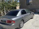 Kia Optima 2002 года за 70 700 тг. в Шымкент – фото 2