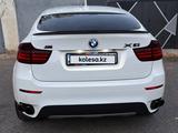 BMW X6 2012 года за 10 200 000 тг. в Астана