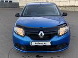 Renault Logan 2014 года за 1 650 000 тг. в Астана – фото 2