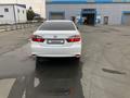 Toyota Camry 2015 года за 10 500 000 тг. в Атырау – фото 4