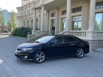 Toyota Camry 2014 года за 6 600 000 тг. в Актобе