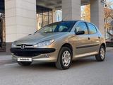 Peugeot 206 2009 года за 2 950 000 тг. в Караганда – фото 3
