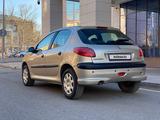 Peugeot 206 2009 года за 2 950 000 тг. в Караганда – фото 4