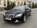 Toyota Camry 2014 годаүшін9 450 000 тг. в Актобе