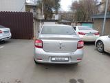 Renault Logan 2016 года за 3 500 000 тг. в Уральск – фото 2