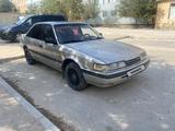 Mazda 626 1992 годаүшін700 000 тг. в Жанаозен – фото 2