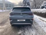 Volkswagen ID.4 2023 года за 12 800 000 тг. в Алматы – фото 3