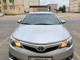 Toyota Camry 2014 года за 8 500 000 тг. в Жанаозен