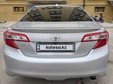 Toyota Camry 2014 года за 8 500 000 тг. в Жанаозен – фото 2