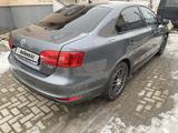 Volkswagen Jetta 2011 года за 3 500 000 тг. в Атырау – фото 4