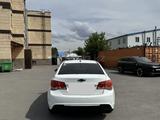 Chevrolet Cruze 2013 года за 1 600 000 тг. в Астана – фото 2