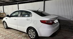 Kia Rio 2013 года за 4 200 000 тг. в Актобе – фото 2