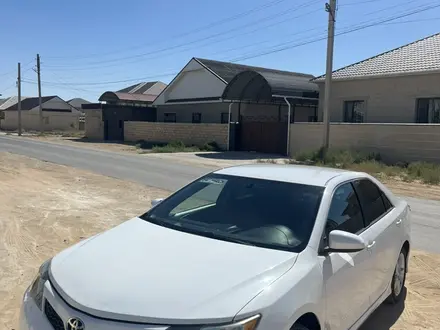 Toyota Camry 2014 года за 6 000 000 тг. в Жанаозен