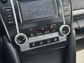 Toyota Camry 2014 года за 8 100 000 тг. в Актобе – фото 22