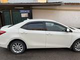 Toyota Corolla 2015 года за 6 490 000 тг. в Алматы – фото 4