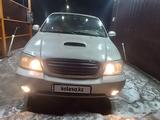 Kia Carnival 1999 года за 1 700 000 тг. в Алматы – фото 2