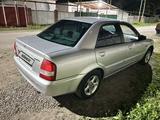 Mazda 323 2001 года за 1 200 000 тг. в Мерке – фото 2