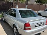 Mazda 323 2001 года за 1 200 000 тг. в Мерке – фото 3