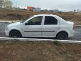 Renault Logan 2013 года за 850 000 тг. в Караганда – фото 3