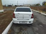 Renault Logan 2013 года за 850 000 тг. в Караганда – фото 5