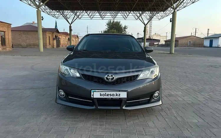 Toyota Camry 2014 годаfor8 550 000 тг. в Шымкент