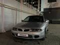 Mitsubishi Carisma 1998 года за 1 300 000 тг. в Алматы – фото 16