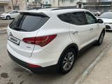 Hyundai Santa Fe 2014 года за 9 600 000 тг. в Атырау