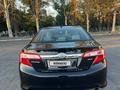 Toyota Camry 2013 года за 6 600 000 тг. в Атырау