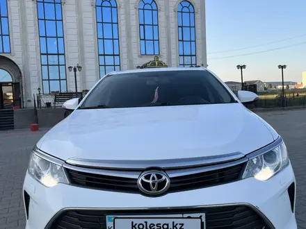 Toyota Camry 2015 года за 11 000 000 тг. в Актобе – фото 3