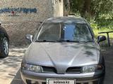 Mitsubishi Carisma 2002 годаүшін1 500 000 тг. в Актобе