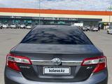 Toyota Camry 2014 года за 6 600 000 тг. в Актобе – фото 3