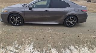 Toyota Camry 2018 года за 8 600 000 тг. в Атырау