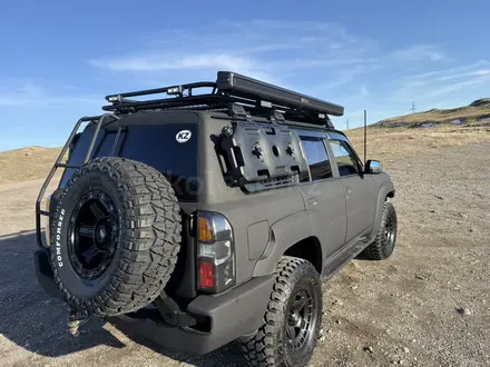 Nissan Patrol 2007 года за 17 000 000 тг. в Алматы – фото 14