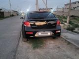 Chevrolet Cruze 2013 года за 2 800 000 тг. в Жетысай – фото 5