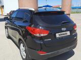 Hyundai Tucson 2013 годаfor7 900 000 тг. в Караганда – фото 2