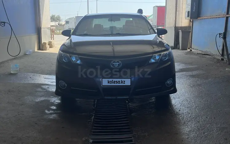 Toyota Camry 2014 годаүшін5 500 000 тг. в Актобе