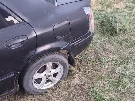 Mazda 323 1998 года за 850 000 тг. в Алматы – фото 2