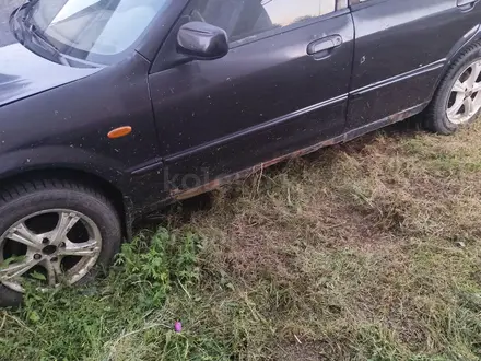 Mazda 323 1998 года за 850 000 тг. в Алматы – фото 3