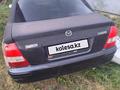 Mazda 323 1998 года за 850 000 тг. в Алматы – фото 4