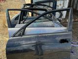 Передняя левая дверь BMW E39 за 30 000 тг. в Караганда