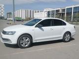 Volkswagen Jetta 2017 года за 6 800 000 тг. в Астана – фото 2