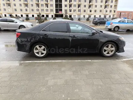 Toyota Camry 2013 года за 6 100 000 тг. в Жанаозен