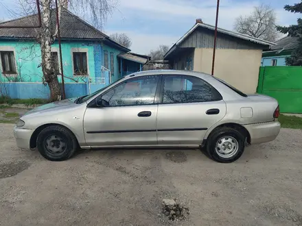 Mazda 323 1995 года за 990 000 тг. в Алматы – фото 2