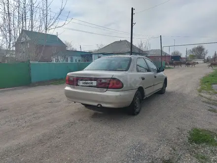 Mazda 323 1995 года за 990 000 тг. в Алматы – фото 6
