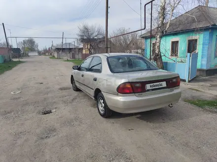 Mazda 323 1995 года за 990 000 тг. в Алматы – фото 8