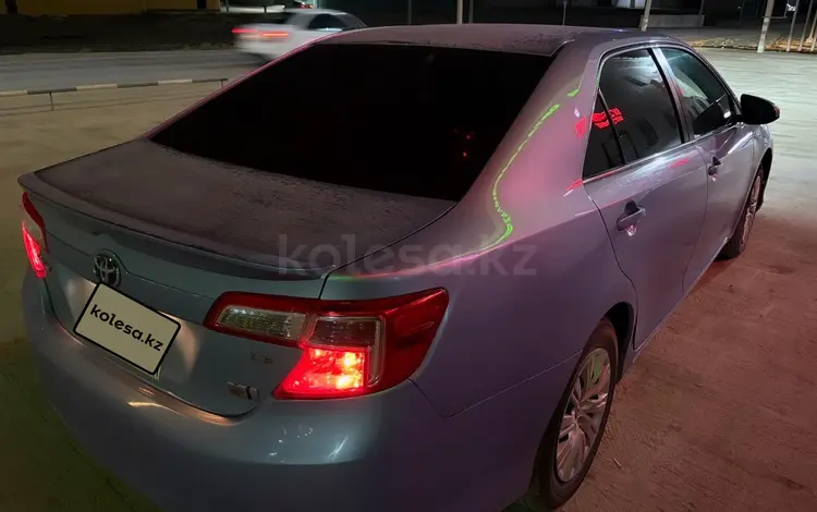 Toyota Camry 2013 года за 5 500 000 тг. в Жанаозен