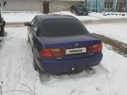 Mazda 323 1995 года за 950 000 тг. в Алматы – фото 4